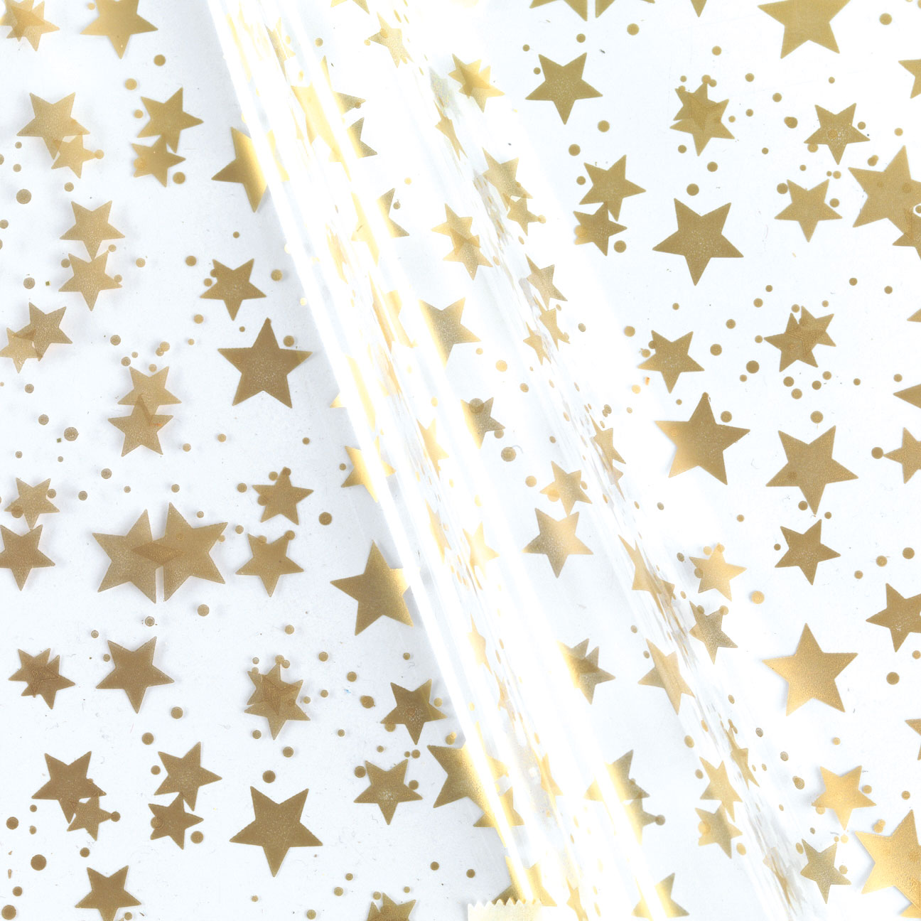 Afbeeldingen van Rol Kerstfolie 70 cm 100 mtr 30 my sterren goud